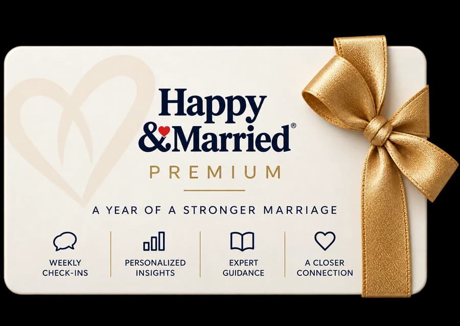 The Happy & Married Premium gift card, tied with a gold ribbon.