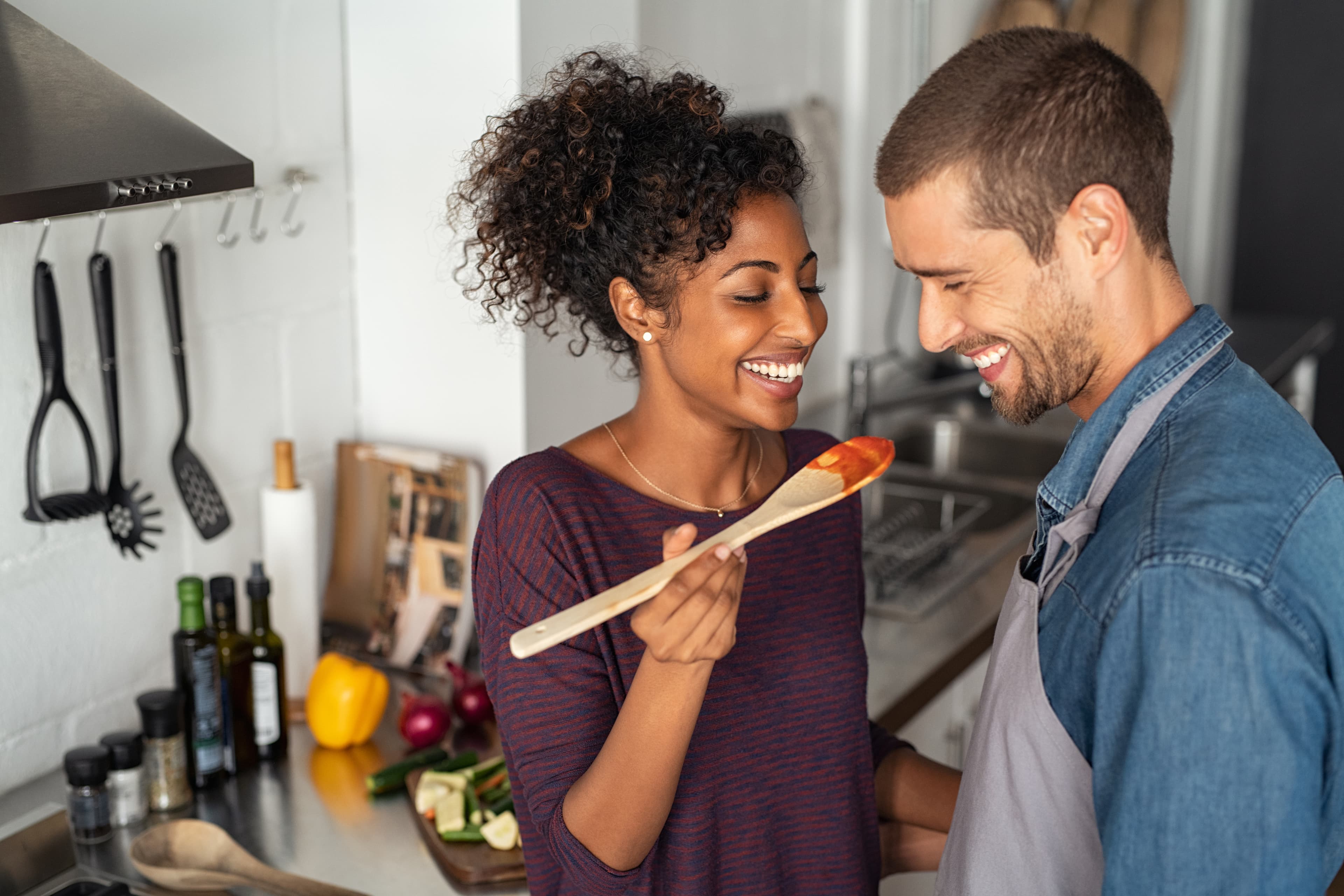 A couple sharing a moment together in the kitchen